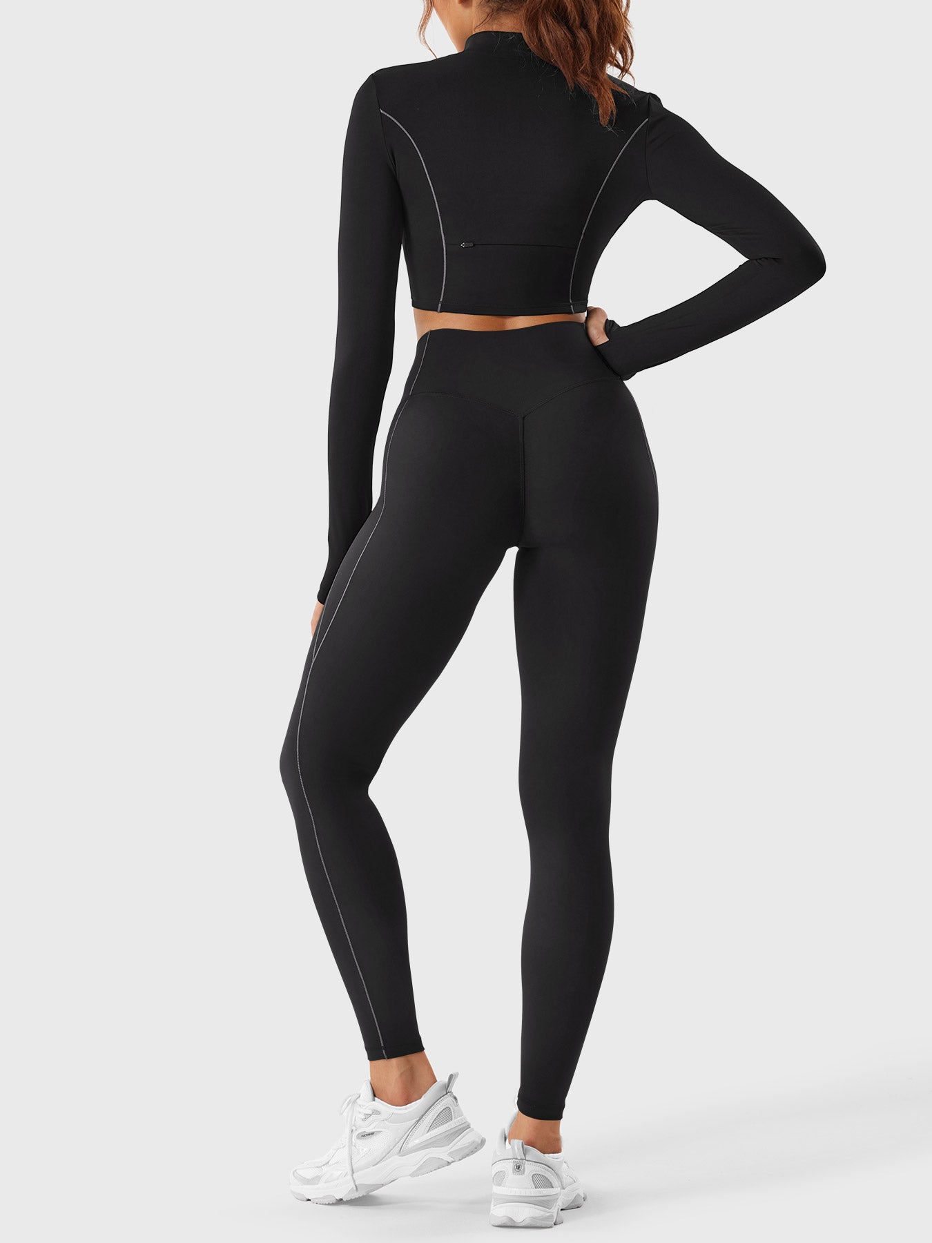 Yeoreo Ensemble sport Clementine à crop top à demi-fermeture éclair et leggings